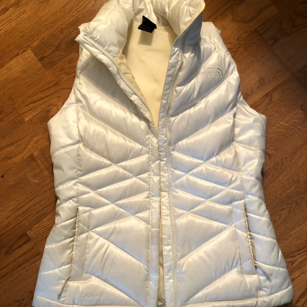 White women’s Northface puffer vest